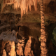 Illustration for article titled What destroyed the Maya? We have a new clue, in the form of an ancient stalagmite.